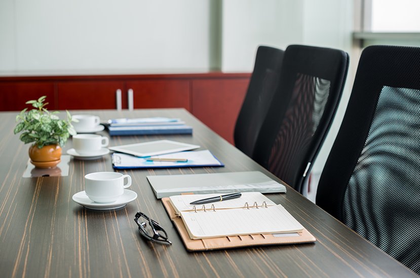 everything for business meeting, conference table with chairs and supplies